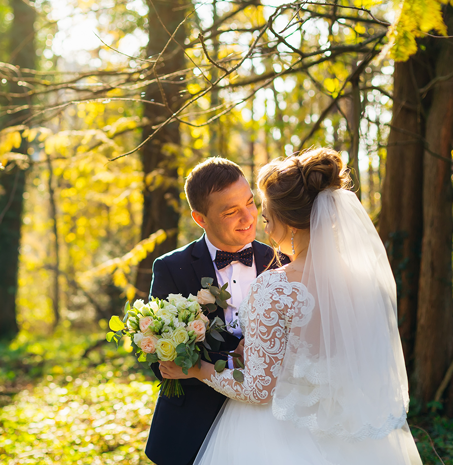 01a A bride and groom in the woods with trees